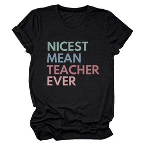Detailed view of Nicest Mean Teacher Ever vintage print on soft black cotton t-shirt fabric