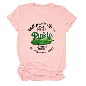 Close-up of the humoristic green pickle graphic print on a pink cotton short-sleeve T-shirt