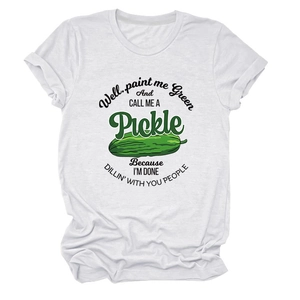 Detail of white cotton T-shirt featuring a green pickle graphic and humorous typography
