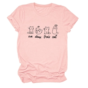 Detail of pink crew neck T-shirt with cartoon cat graphic and un deux trois cat print