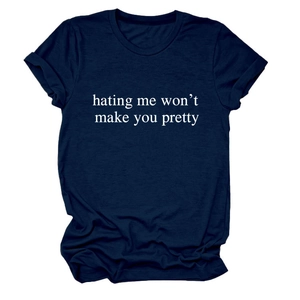 Detail of rolled cuffs and white slogan on navy blue cotton crewneck t-shirt