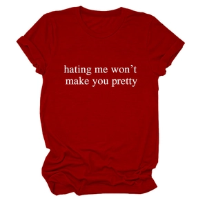 Detail of red crew neck T-shirt with white hating me won't make you pretty slogan print