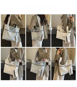 Detailed views of a white textured tote bag with matching small pouch and black zipper