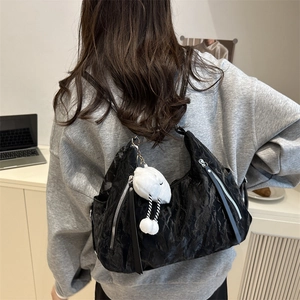 Minimalist black pleated backpack with silver zipper and cute cloud pendant for daily commute