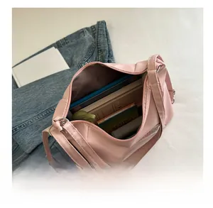 Top view detail of large capacity pink tote showing spacious interior for books and items