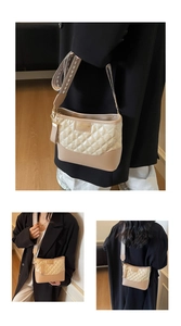 Detail of rhombic lattice patent leather and beige stitching with a wide woven strap