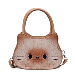 Cute bread-shaped cat handbag with brown matte texture and adjustable shoulder strap
