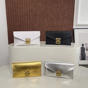 Minimalist envelope clutch bag in black, white, gold, and silver with metal buckles