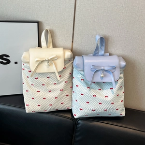 Chic women's bow print backpack with pearl pendant in cream and light blue colors