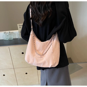 Pink large capacity hobo bag with textured fabric and elegant metal chain detail