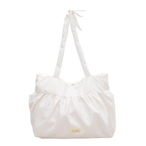 Minimalist white pleated tote bag with tie-strap shoulder design for women