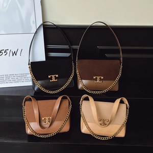 Vintage crossbody bags in four colors with suede paneling and gold chain hardware
