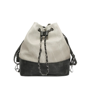 Retro patchwork bucket bag in light grey and black leather with adjustable chain straps
