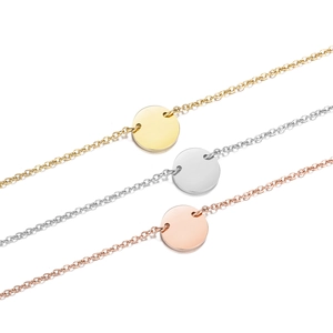 Three minimalist stainless steel round disk necklaces in gold, silver, and rose gold finishes