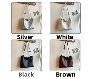 Four color options for minimalist tote bags with geometric texture and chain straps