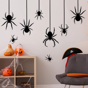 Halloween wall decals featuring black spiders in various sizes for spooky home decoration