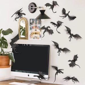 Close-up of 3D black glitter dragon wall stickers with textured shimmer finish for decor