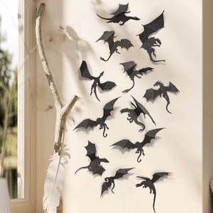 Detailed view of 3D glitter black dragon wall stickers in various flying poses for home decor