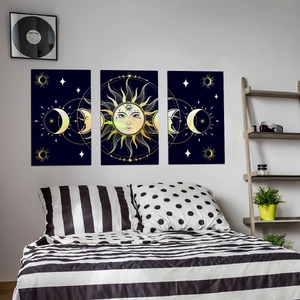 Dettaglio del set di adesivi murali con sole e luna in una camera da letto moderna