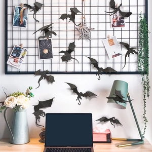 Black glitter 3D bat wall stickers decorating a creative home office workspace