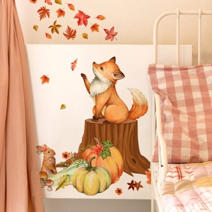 Detail of autumn forest wall stickers featuring fox and bunny in cozy nursery setting