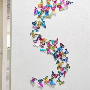 Detailed view of 3D colorful metallic butterfly wall stickers in a dynamic S-curve pattern