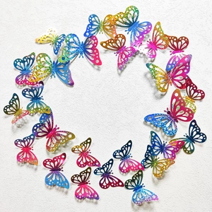 Detail of 3D laser rainbow butterfly wall decals with hollow design and holographic finish