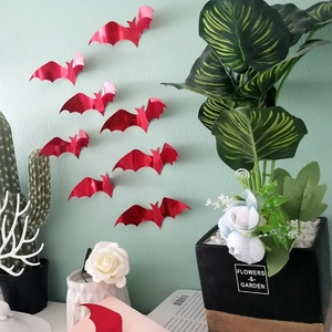 3D shiny red bat wall stickers for Halloween party decor on light blue textured wall