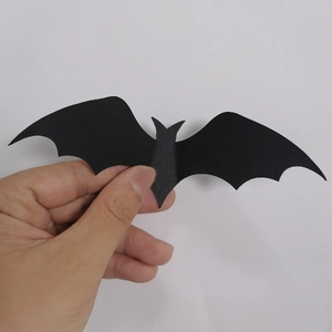 Detail of 3D black laser bat wall stickers showing folding creases and matte texture