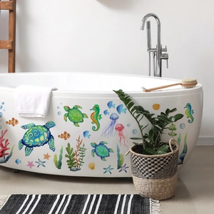 Detailed view of colorful sea turtle and ocean creature wall stickers in bathroom setting