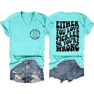 Detail of V-neck T-shirt with humorous pickle graphic and distressed denim shorts