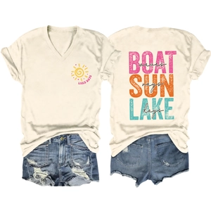Detail view of V-neck T-shirt back print with BOAT SUN LAKE text and denim shorts