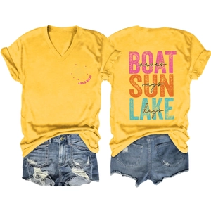 Detail of yellow V-neck Lake Days T-shirt with Boat Sun Lake back print and denim shorts