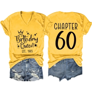 Detail showing yellow V-neck T-shirt with Chapter 60 print and distressed denim shorts