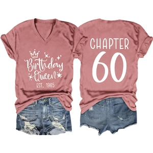 Flat lay of V-neck T-shirt and denim shorts with Chapter 60 Birthday Queen print