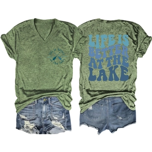 Detail view of V-neck t-shirt with 'life is better at the lake' print and denim shorts