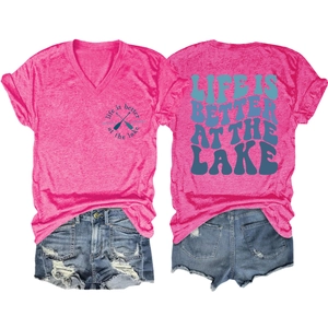 Detailed front and back view of pink V-neck t-shirt with slogan and denim shorts set