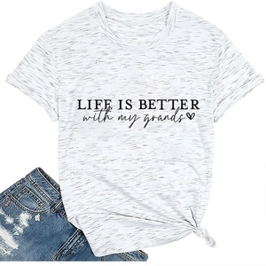 Detail of marled white T-shirt with 'LIFE IS BETTER' print and side knot design
