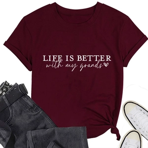 Close-up of Life is Better with My Grands burgundy tee with white heart letter print