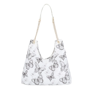 Borsa tote in tela bianca con schizzi di farfalle e tracolla a catena dorata