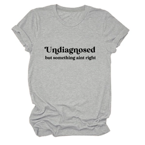 Close-up of rolled sleeves and graphic print on a gray crew neck short sleeve t-shirt