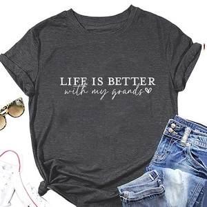 Detailed flat lay of a heather grey t-shirt with LIFE IS BETTER with my grands text