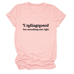 Detail of light pink crew neck T-shirt with black Undiagnosed slogan print