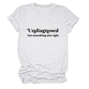 Detail of white cotton T-shirt featuring black artistic slogan print and crew neck design