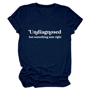 Detail of navy blue crew neck T-shirt featuring white text print and rolled cuff sleeves