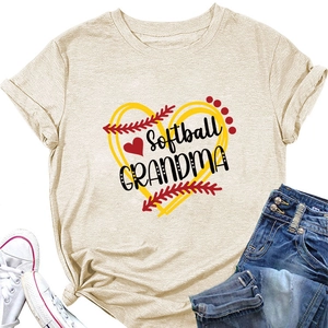 Flat lay of a beige Softball Grandma t-shirt with denim shorts and white canvas sneakers