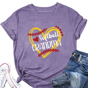 Close-up of Softball Grandma print on purple tee with baseball heart and stitching