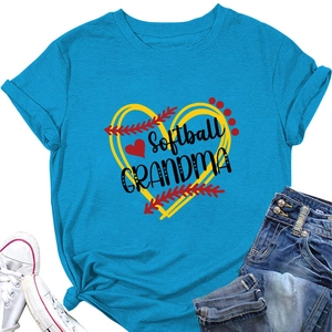 Detailed close-up of a blue t-shirt featuring Softball Grandma heart graphic and casual outfit