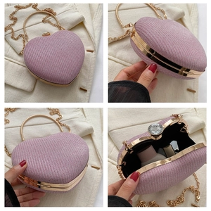Detailed views of pink heart evening bag with glitter fabric and rhinestone clasp
