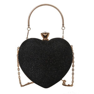Sparkling black heart-shaped evening bag with gold metal handle and luxury chain strap